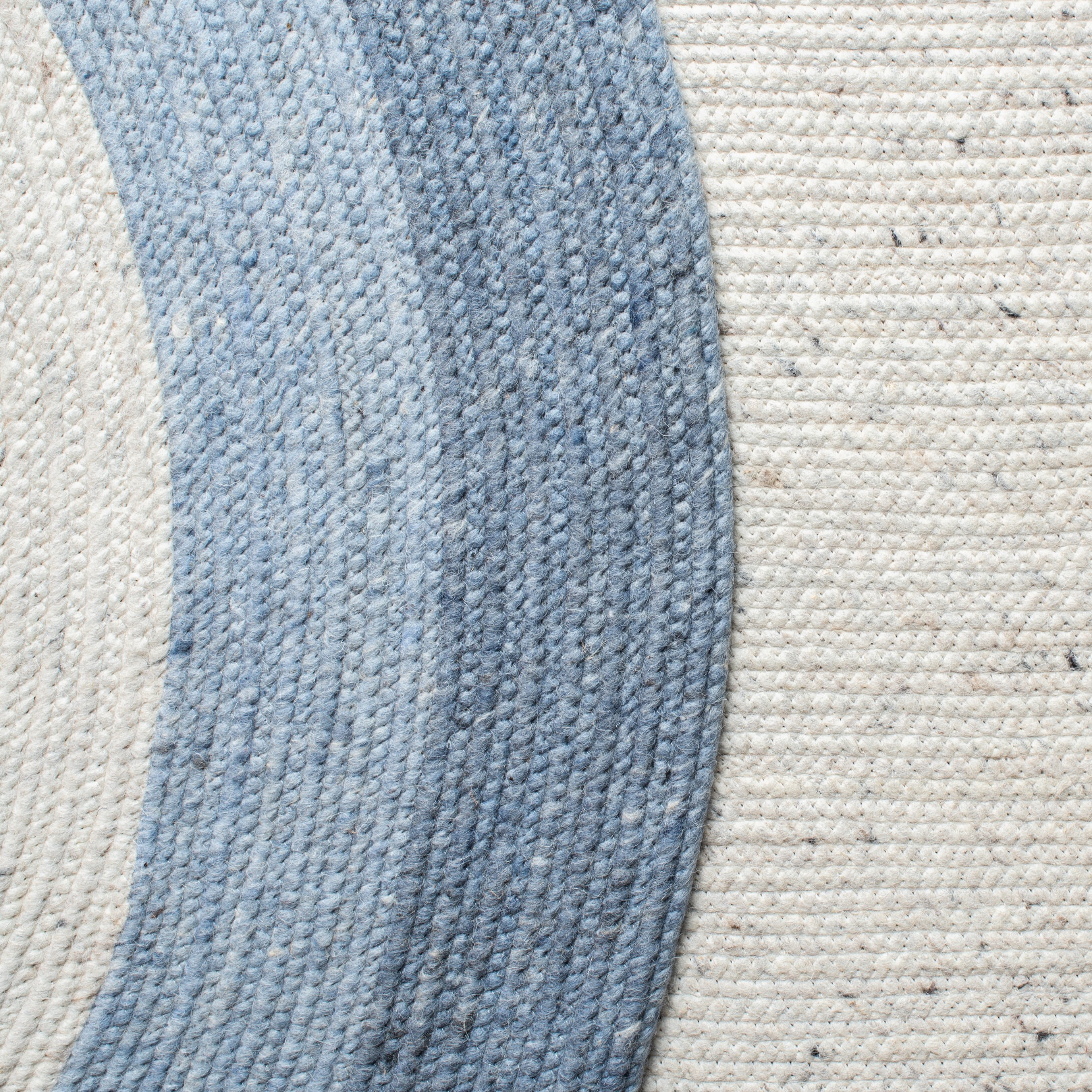 SAFAVIEH Braided Nazca Solid Bordered Area Rug, Ivory/Blue, 4' x 6' Oval