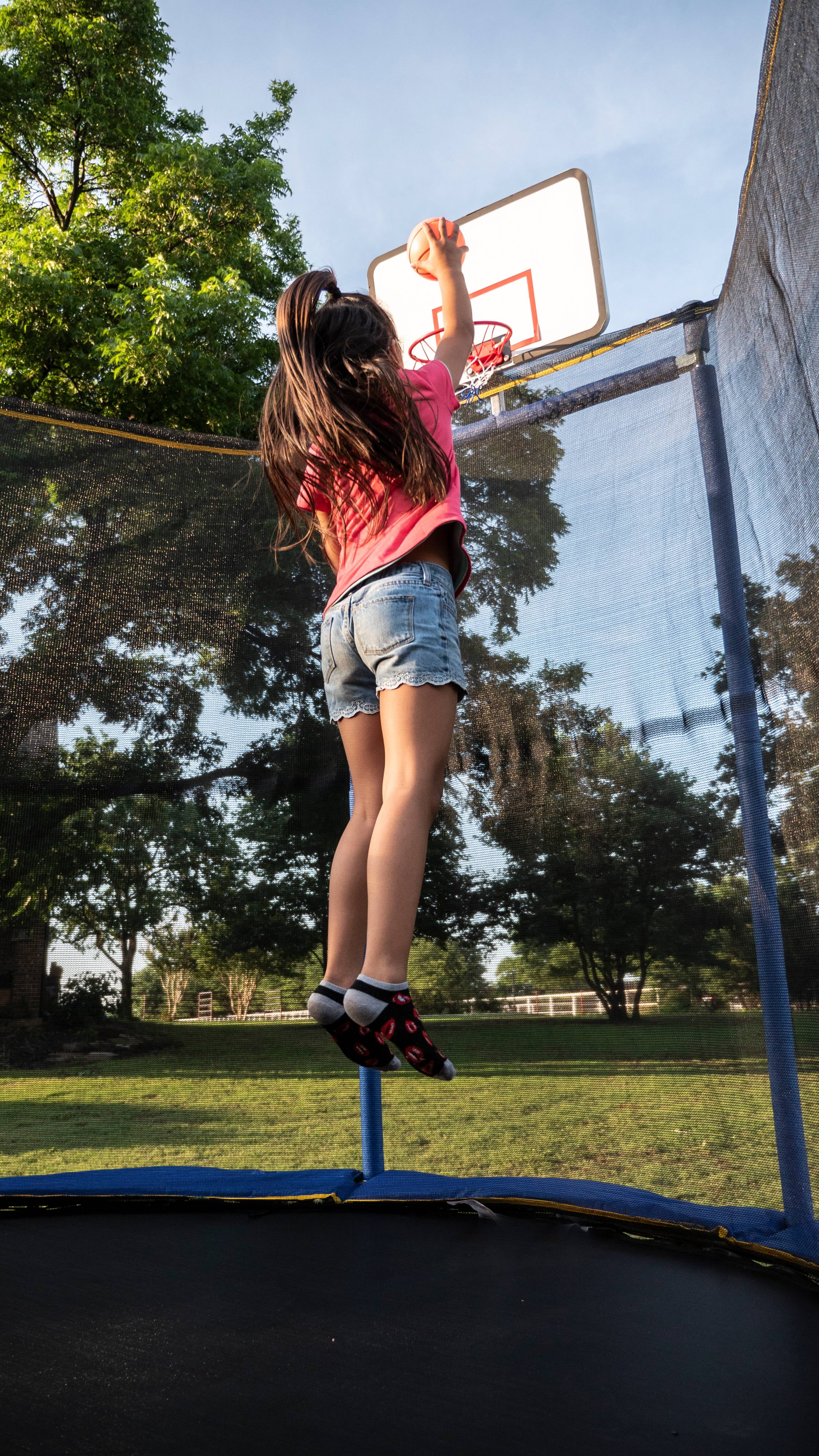 Jumpking Oval 10' x 15' Trampoline, with Two Basketball Hoops, Blue/Yellow