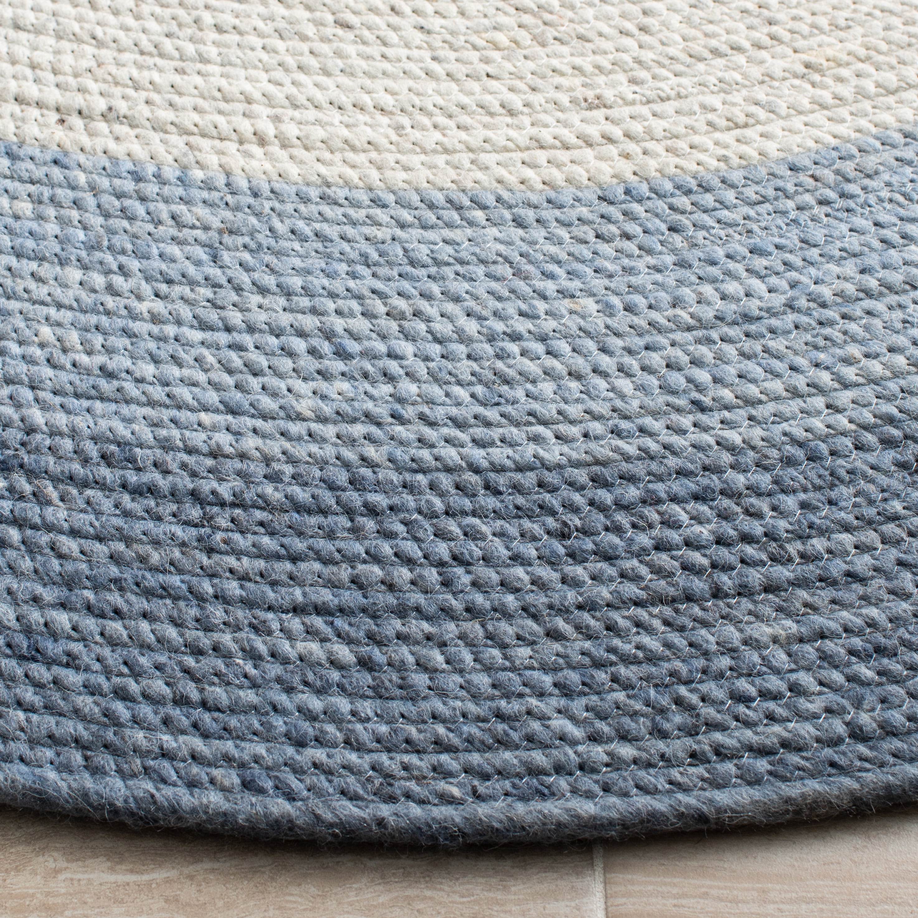 SAFAVIEH Braided Nazca Solid Bordered Area Rug, Ivory/Blue, 4' x 6' Oval